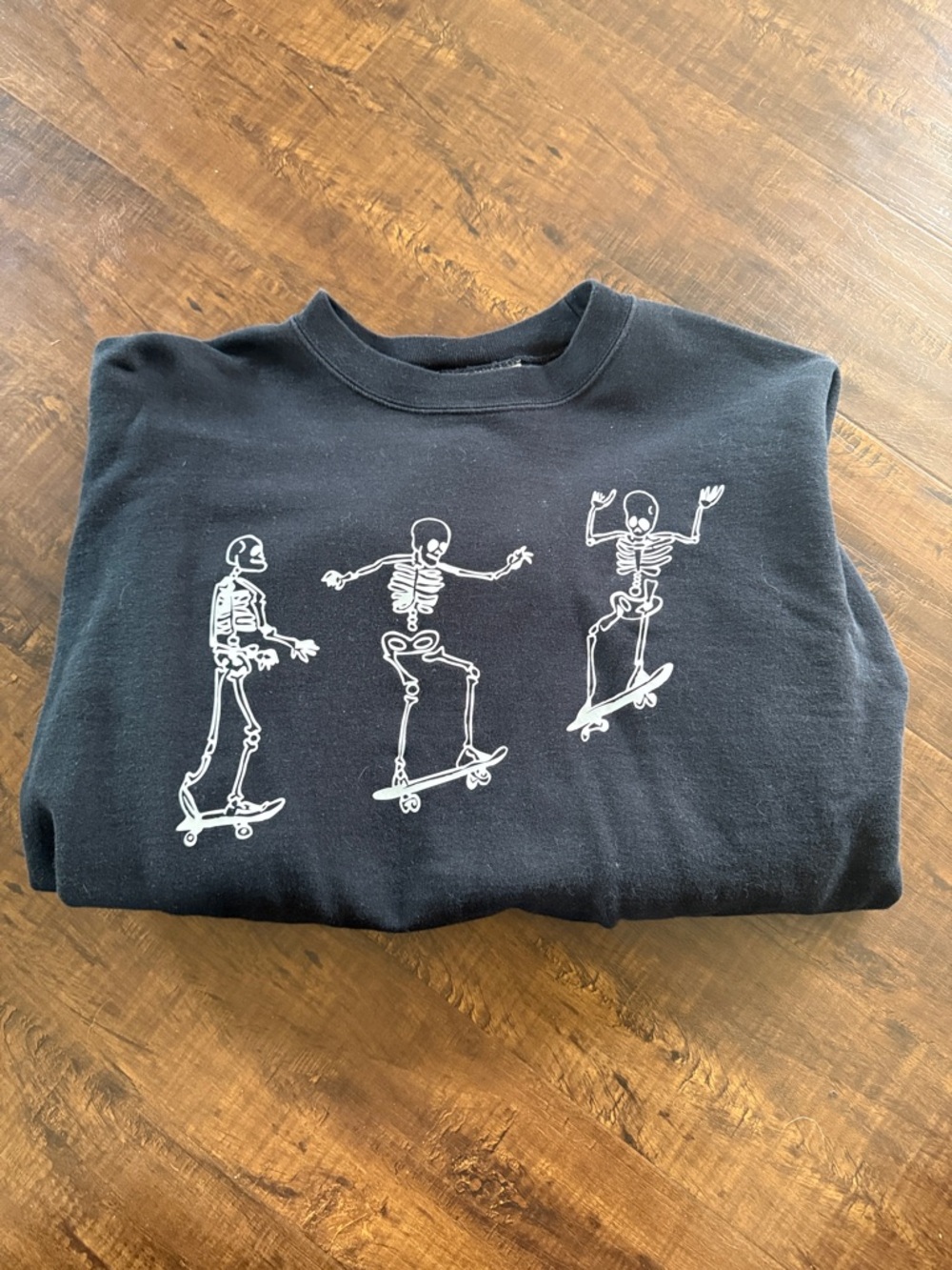Black Crew Neck Sweatshirt with White Skateboarding Skeletons